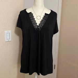 Black blouse with lace back
